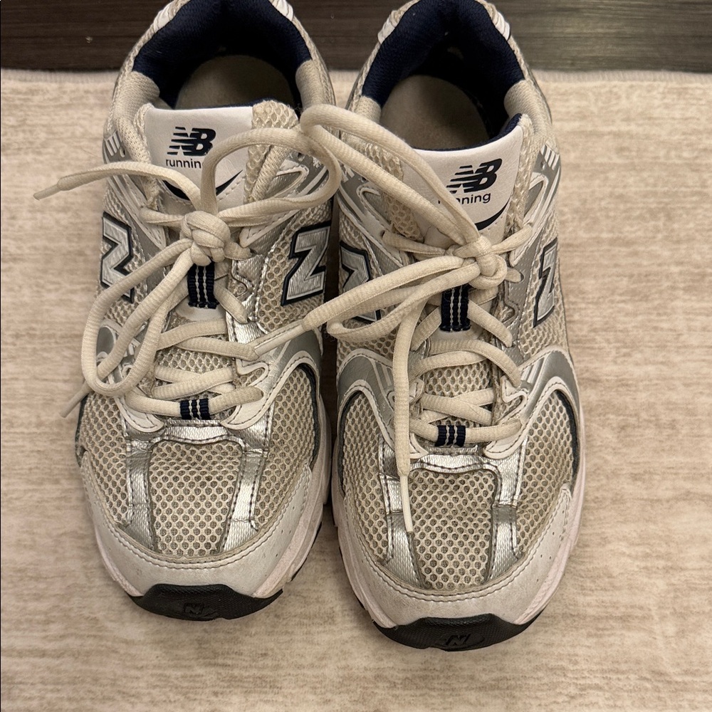 New Balance women’s ' Silver Navy  and White Sneakers 8.5